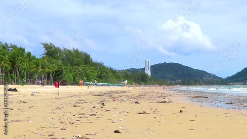 Tropical shoreline overwhelmed by disgusting trash pollution and ocean debris Thailand.
