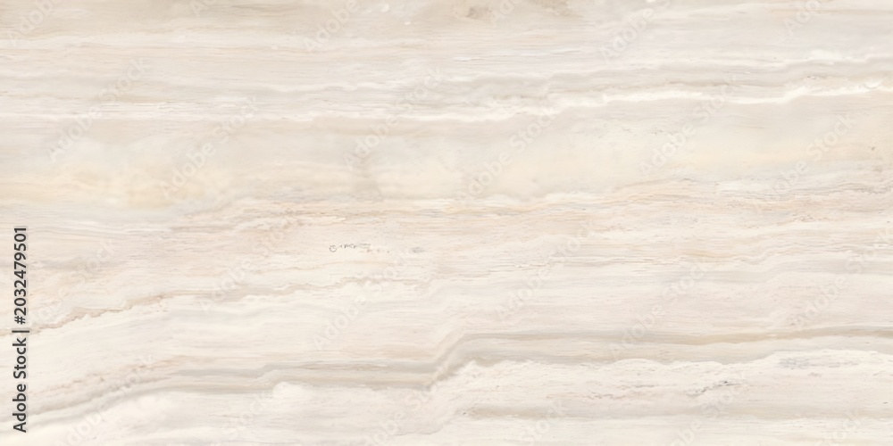Fototapeta premium A natural beige travertine marble texture displaying prominent, organic horizontal layers and warm cream tones across a polished stone surface