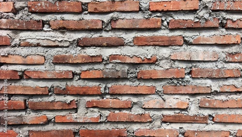 Quadro su tela Red Brick Wall Pattern Arranged in Neat Horizontal Rows with Natural Daylight Ma
