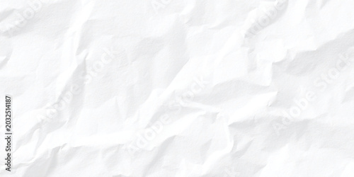 Fotografía Crumpled white paper texture background with creases and folds