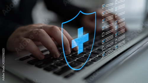 Tableau sur toile Hands Typing on Laptop Keyboard With Digital Shield and Health Checklist Overlay