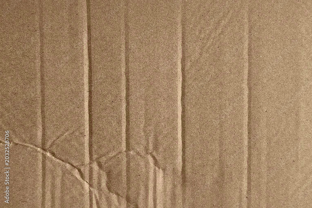 Fototapeta premium Textured brown cardboard surface background