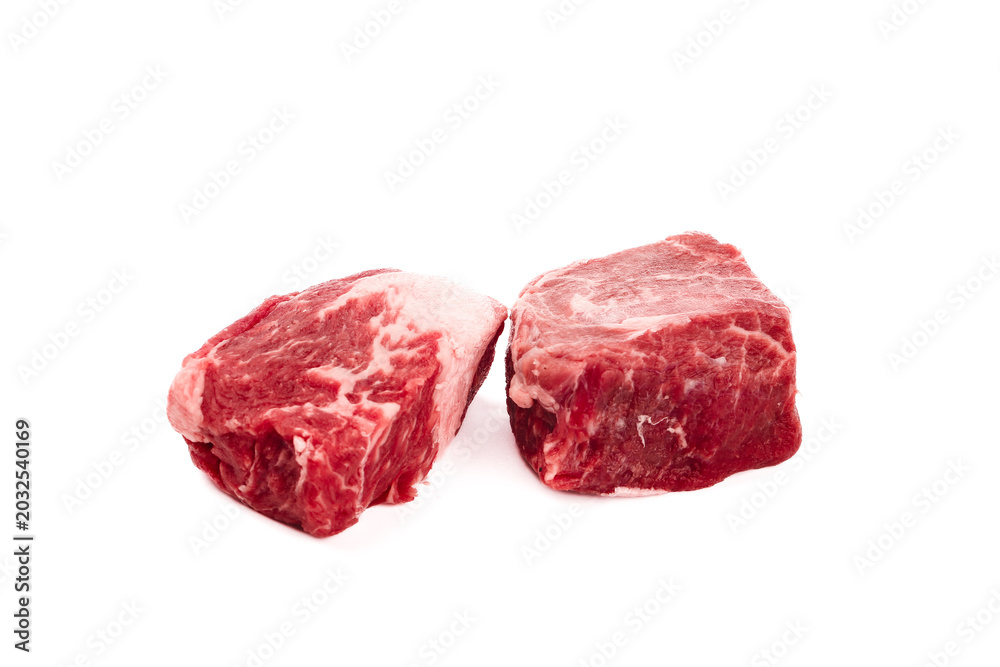 Obraz premium Fresh Raw Beef Steaks Isolated on White Background for Gourmet Cooking
