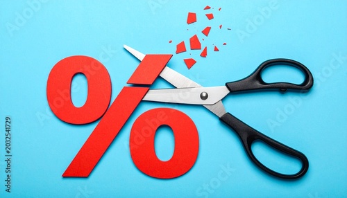 Scissors cutting red percentage symbol representing discount or price reduction