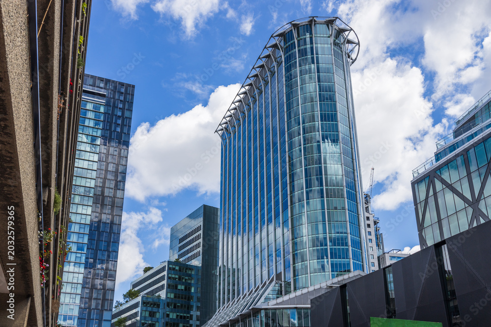 Obraz premium Low angle view of corporate office towers in downtown