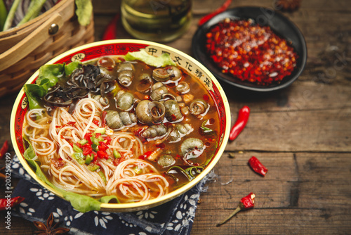 Spicy Chinese Rice Noodle Soup with Snails and Chili