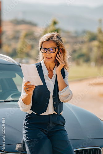 driver calling car travel assistance, insurance