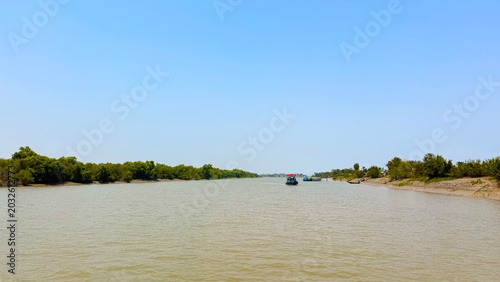 Clear Blue Sky Above Calm Natural River Landscape