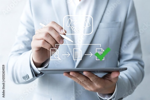Procurement process management concept with digital and paper document approval, contract verification, supplier negotiation, and purchasing operations using laptop