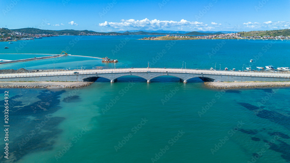 Fototapeta premium Aerial Drone View of Historic Arch Bridge Connecting Islands in Ayvalik Turkey