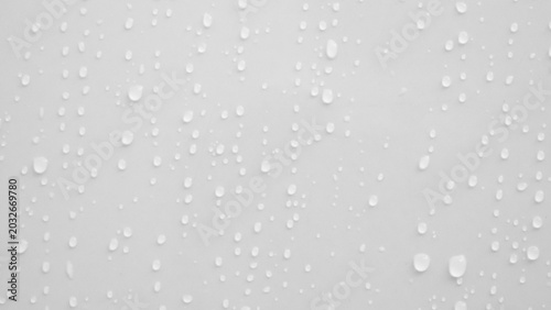 Quadro su tela Water drops on white wall background texture