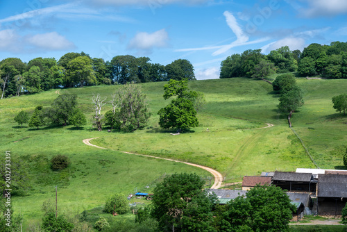 winding path up from a farm