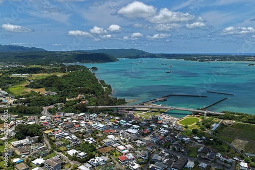 Aerial drone photo of Nago city coastline and turquoise bay in Okinawa, Japan