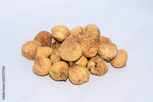 Whole Dried Figs on Plain Background