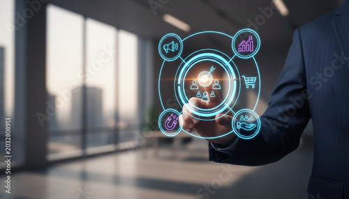 A hand in a suit interacts with a holographic interface displaying business icons, symbolizing digital strategy and planning for success