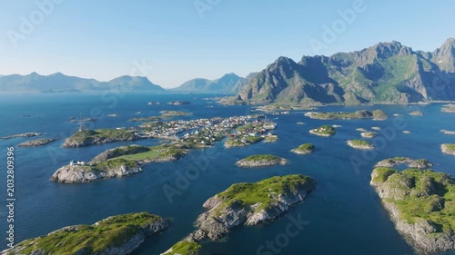 Aerial drone view of Henningsvaer village, Lofoten islands, Norway. Scenic summer video with mountains, islands and ocean. Scenic view. Travel and arctic nature in Scandinavia.
