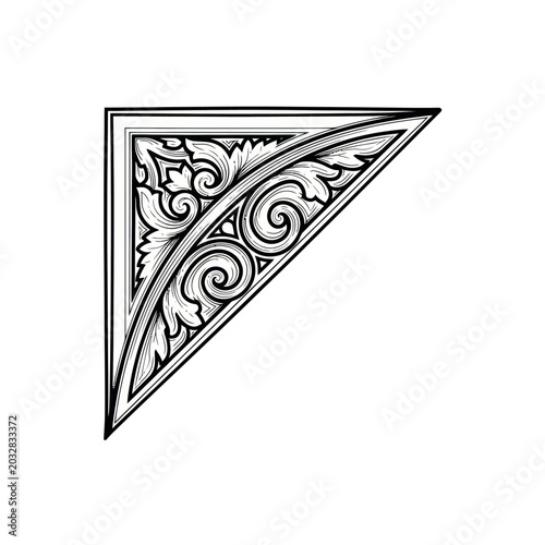 Decorative triangle with swirling patterns.