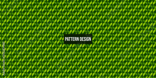 Green leaf pattern design with repeating shapes and texture