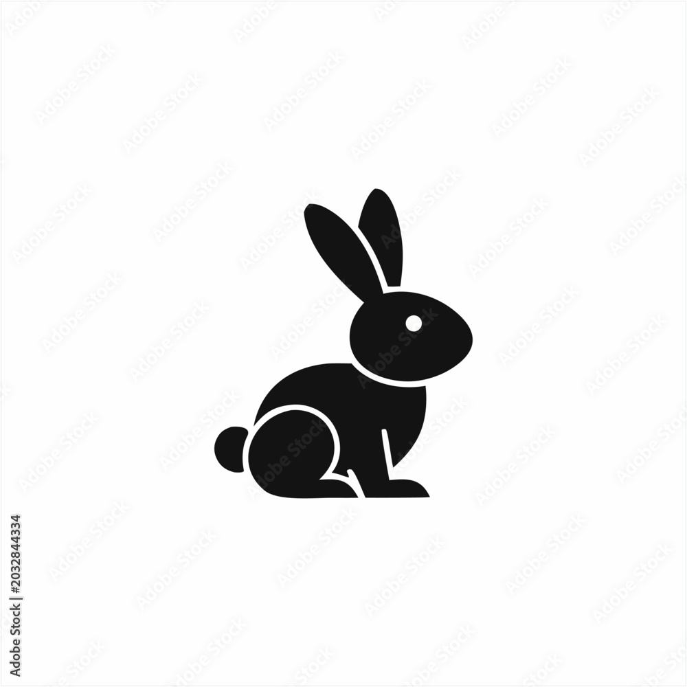 Obraz premium Black rabbit silhouette in minimalist style with simple white outline on plain white background for Easter or spring designs