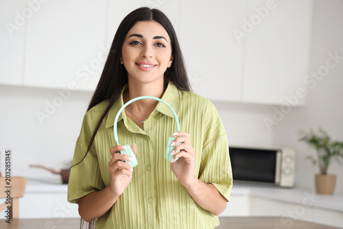 Beautiful young woman with ...