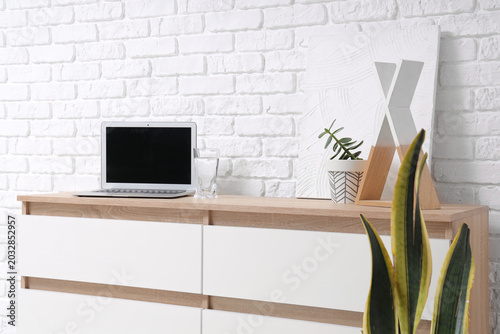 Wooden chest of drawers wit...