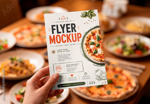 Restaurant flyer mockup in hand