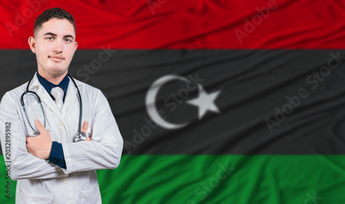 Foto Portrait of medical professional on Libya flag background