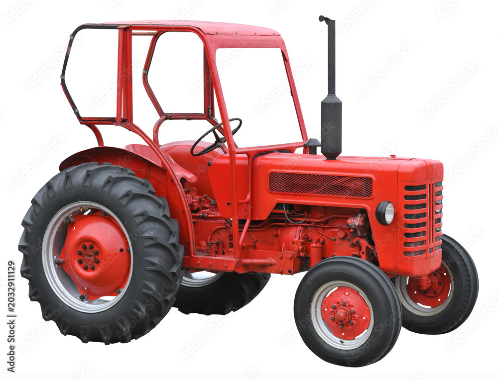 Obraz premium Big red wintage tractor isolated on white background