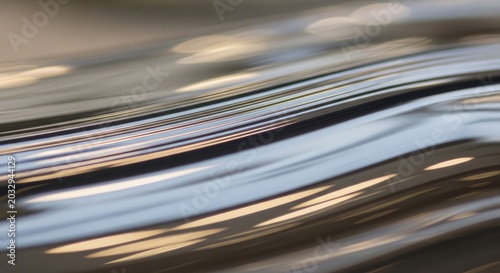 Abstract Metallic Surface with Wavy Lines and Reflections, Modern Design.