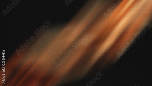 Fotografia Abstract golden light rays streaking across a dark textured background represent