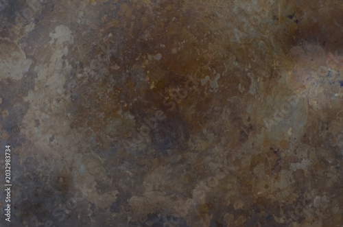 Dark grungy copper industrial plate background with weathered chemical oxidation details