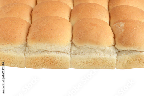 isolated row of mini bread roll buns