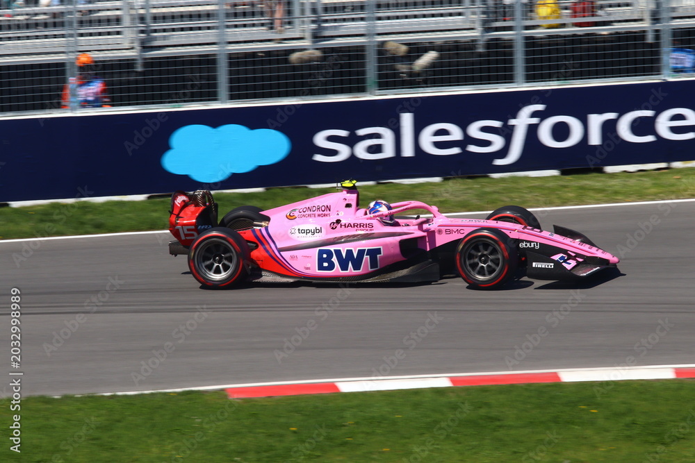 Obraz premium May 22, 2026, Montreal, Canada, F1 Academy car races through Circuit Gilles Villeneuve during Grand Prix weekend. g.