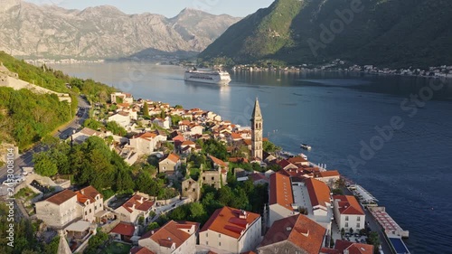 aerial drone view of Perast old town with cruise ship in Bay of Kotor, Montenegro