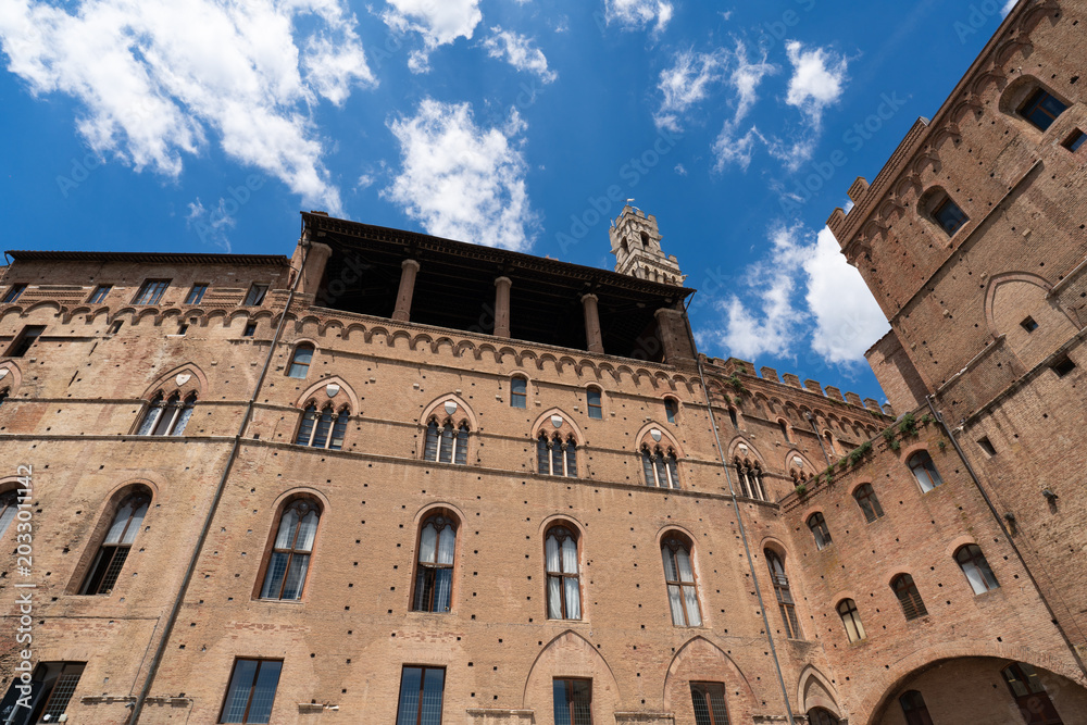 Obraz premium Palazzo Pubblico (town hall) is a historic palace in Siena, Italy