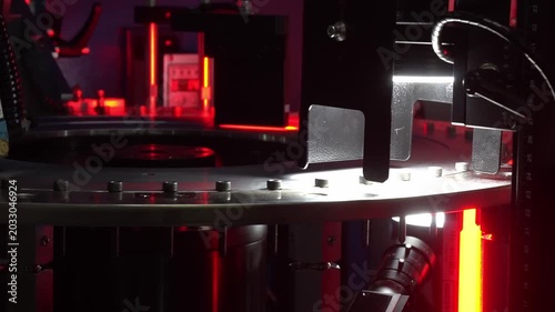 Automated quality control video of a mass production line checking socket head cap screw parts using a machine vision method.