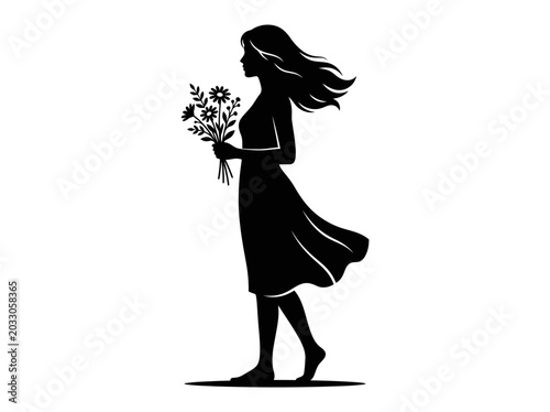 Silhouette of a young woman walking with a bouquet of wildflowers.