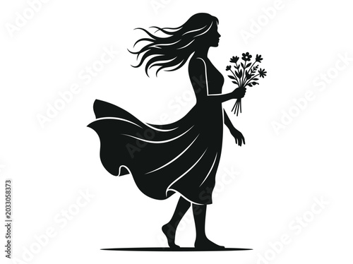 Black silhouette of a young woman walking with flowers in her hand.