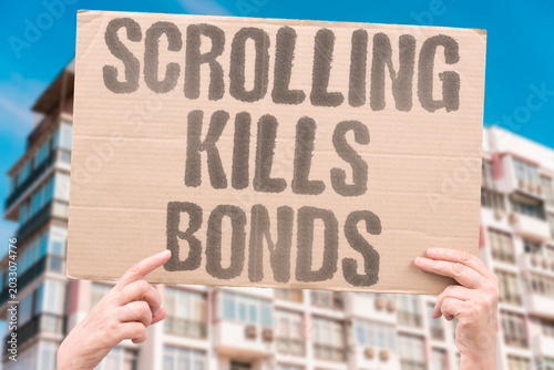 Photos "Scrolling Kills Bonds" Endless feed consumption quietly erodes meaningful human relationships