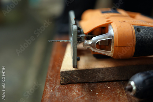 Head of electric saw machine and drill machine. image
