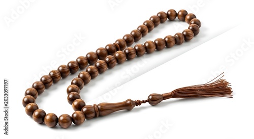 Islamic prayer beads tasbih with tassel brown wooden rosary on white background