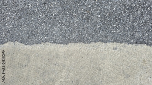 Foto Asphalt and concrete road surface texture contrast