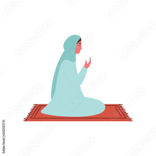 Muslim Woman Praying on Red Prayer Rug in Peaceful Meditation Pose