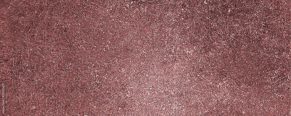 Fototapeta premium A closeup view of a textured red metallic surface with scratches and marks