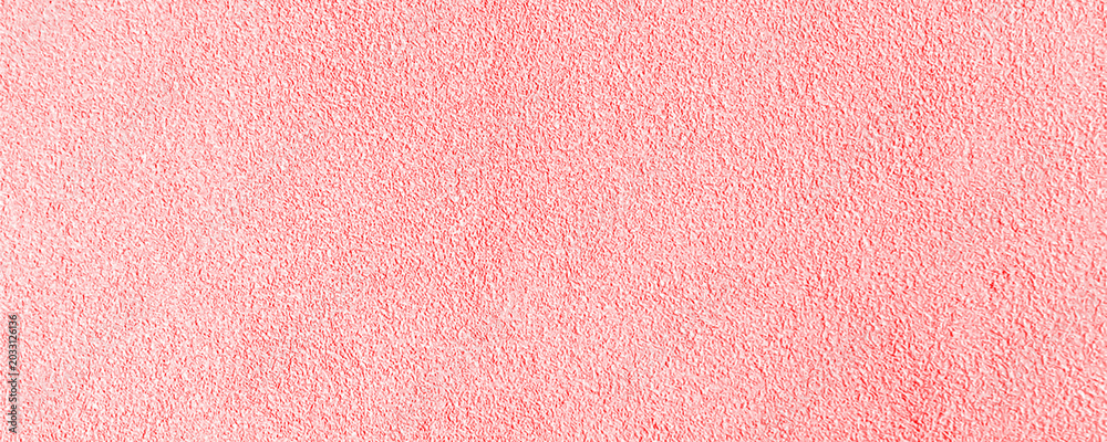 Fototapeta premium Soft pink textured surface with a subtle grainy pattern and a gentle sheen