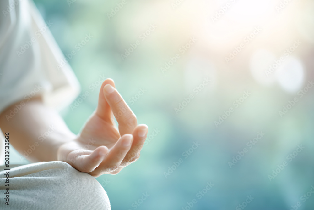 Fototapeta premium Meditation practice serene environment hands in pose soft backlight glow airy atmosphere for mindfulness
