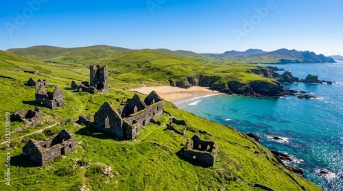 Aerial View of Ancient Castle Ruins on Green Coastal Hill Overlooking Sandy Beach Bay.