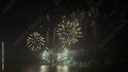 big beautiful colorful festive fireworks display at celebration of pyrotechnic show in the night sky