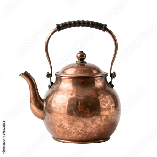 Close up of a vintage copper tea kettle on a white background surface