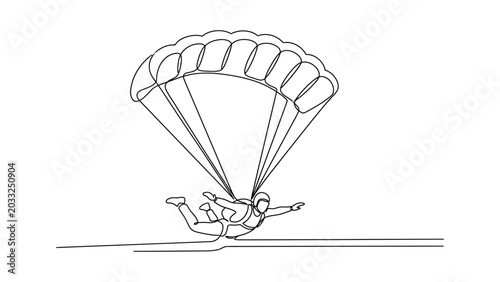 A person paragliding through the air.